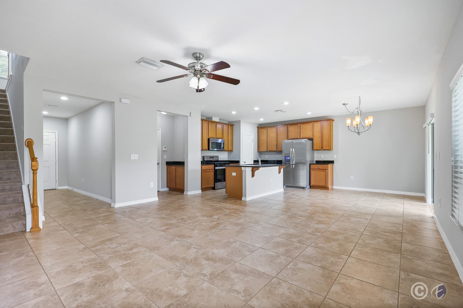 Home for Rent: 16010 Persimmon Grove Dr, Lithia - Living Room/Dining Room/ Kitchen